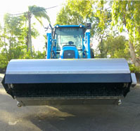 Bobcat with bucket broom